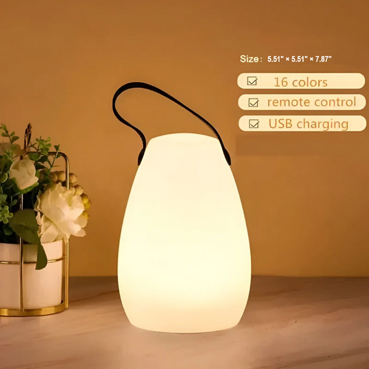 Rechargeable wireless LED lamp, waterproof, provides indoor/outdoor table lighting.