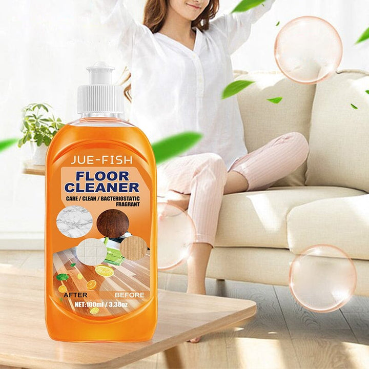 Universal floor cleaner with plant-based ingredients shown on a kitchen floor, effectively removing dirt.