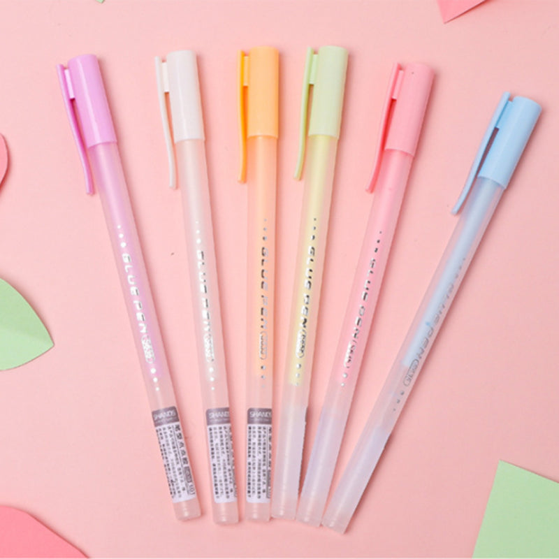 A crafter's desk with the Quick Dry Precision Glue Pen, essential for complex art & craft projects