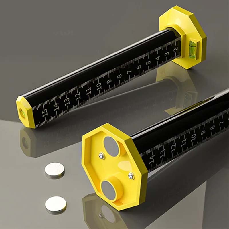 Magnetic level tool attached to a metal stud, ensuring precise vertical alignment for walls.