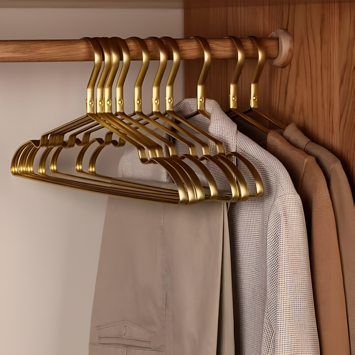 Soft touch velvet clothes hangers in a sleek design, offering anti-slip luxury for efficient closet storage.