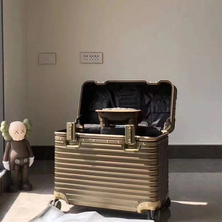 Lightweight aluminum hardshell carry-on with silent spinner wheels. Effortless airport navigation.