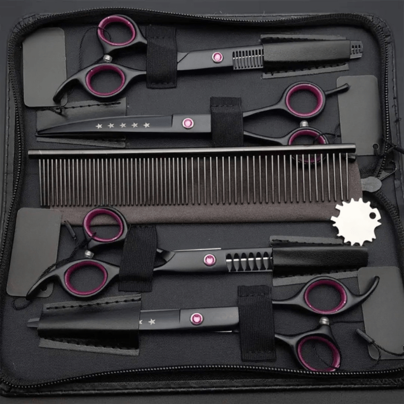 Professional dog & cat grooming scissor set. Includes straight, curved & thinning shears for precise pet coat care.
