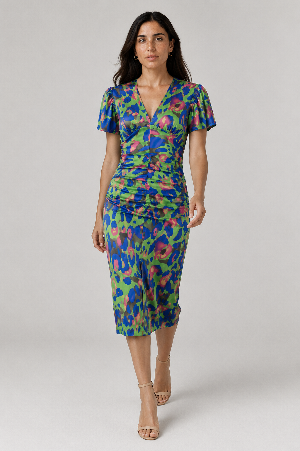 Stylish women's midi dress with a V-neck, puff sleeves, and a chic gathered waist, abstract print.