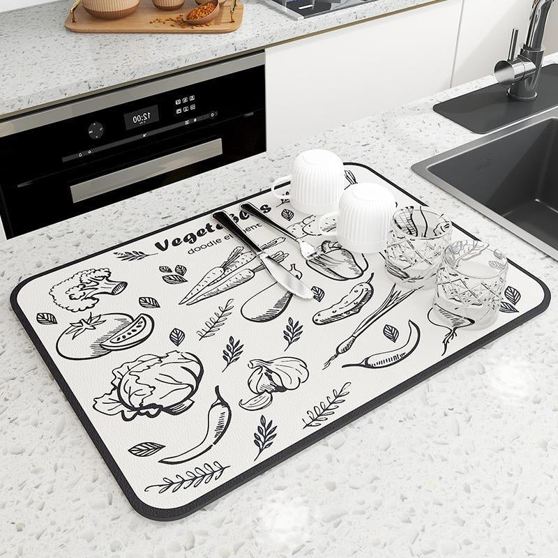 Durable quick-dry diatomaceous earth mat, an essential kitchen accessory and counter protector.