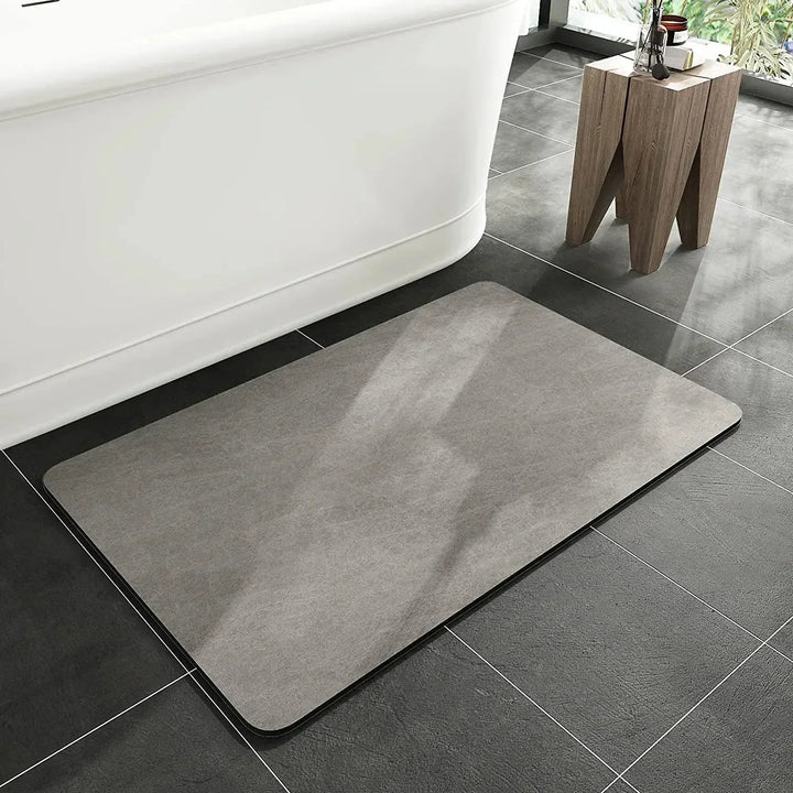 Multi-use quick dry diatomite mat: ideal as an anti-slip bath mat, absorbent entryway mat, or kitchen floor mat.