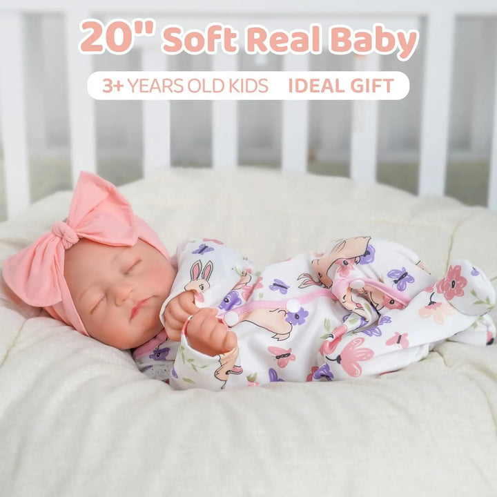 Detailed realistic newborn doll, soft vinyl, designed for immersive nurturing and comforting play.
