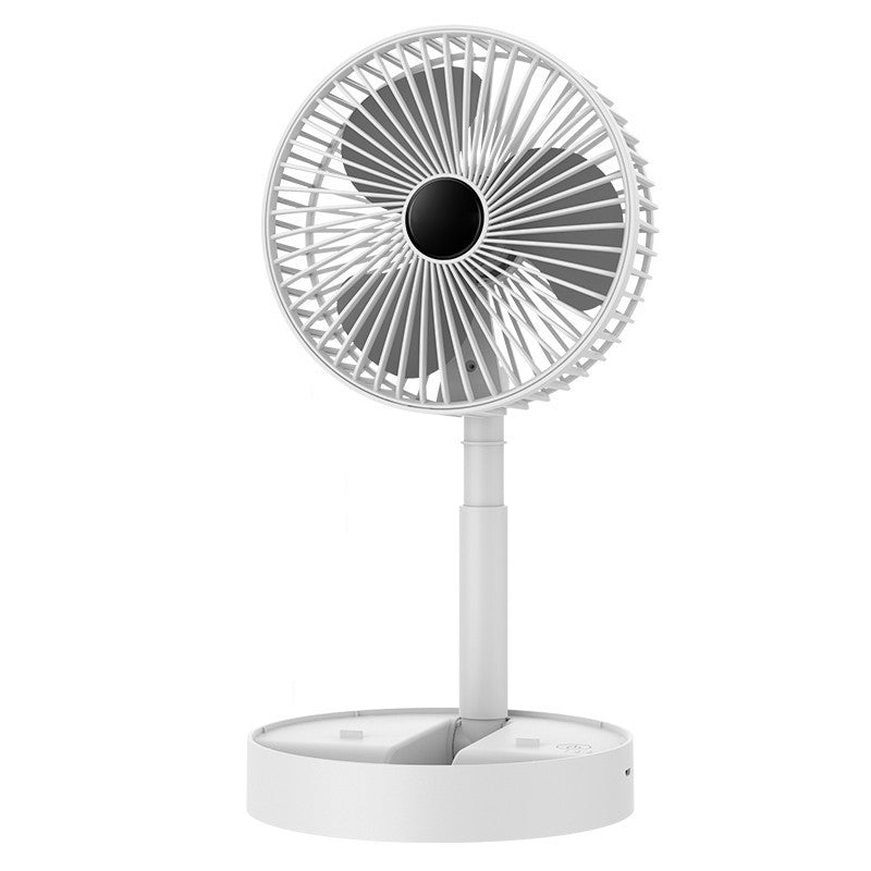 Personal cooling fan, rechargeable, used by a student studying at a desk.