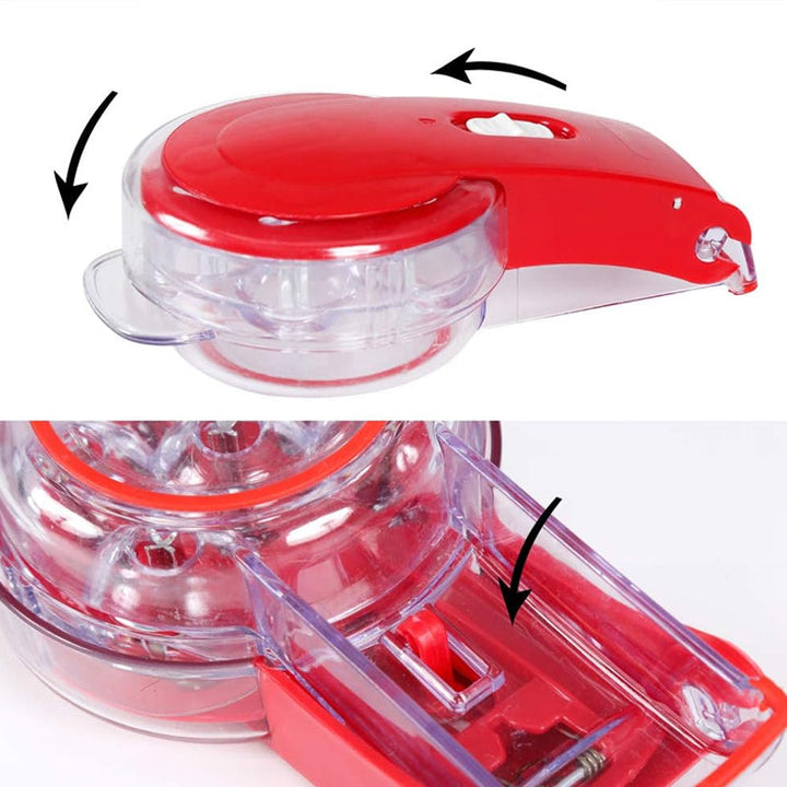 Hand holding a 6-cherry capacity pitter, demonstrating ease of use in the kitchen.