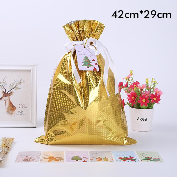 Small silver drawstring gift bag, perfect for jewelry or small holiday gifts. Festive party supply.