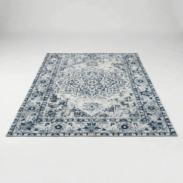 Richly patterned oriental statement rug with Flowique waves & medallions in red & blue, stunning home decor.