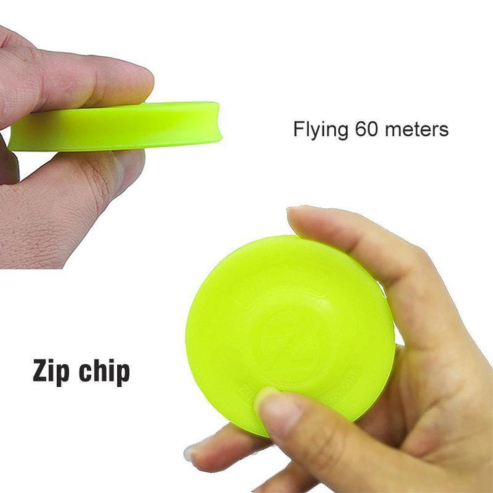 Close-up of a green pocket flying disc, highlighting its durable silicone material for sports and outdoors.