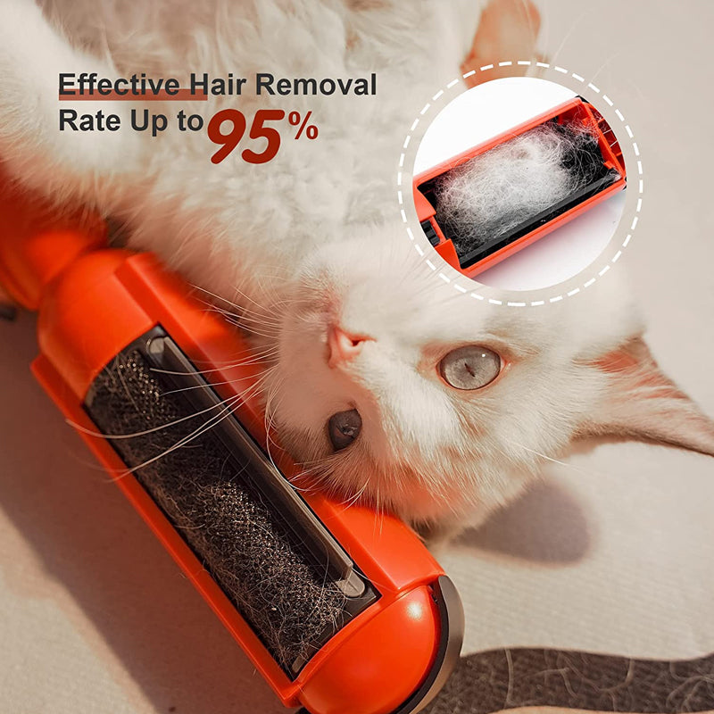 Red pet hair remover lying next to a pile of removed dog fur on a white background