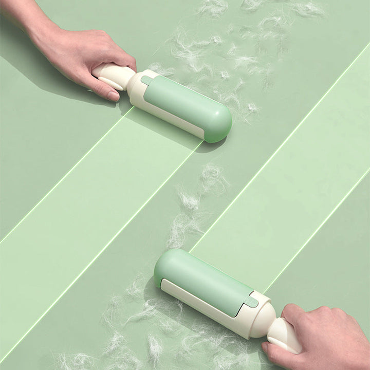 Woman effectively cleaning a carpet with a green reusable pet hair remover