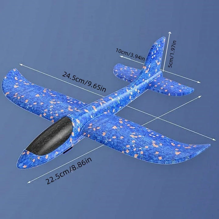 Handheld SkyBlitz foam glider and launcher set, glowing for night outdoor play.