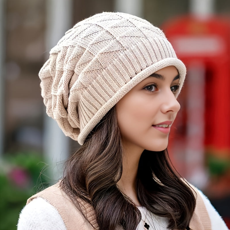 Red women's lightweight knitted beanie for spring & fall, soft acrylic stretch fit.