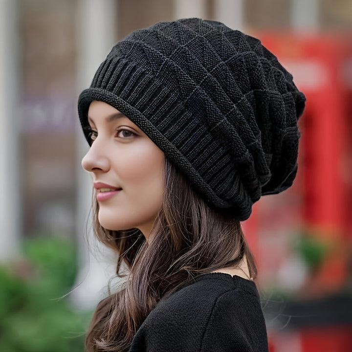 Women's everyday red knitted beanie, lightweight & elastic, a spring/fall wardrobe staple.