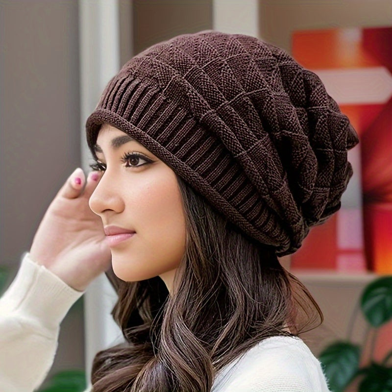 Stylish women's red knitted beanie, lightweight acrylic for spring/autumn travel.
