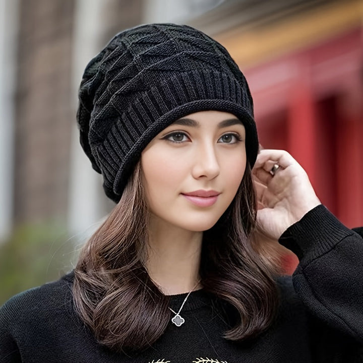 Lightweight women's knitted beanie in red, ideal for spring & fall outdoor activities.