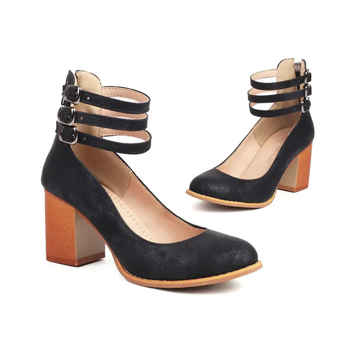 Side view of women's block heel pumps with triple straps, showing heel height and comfort