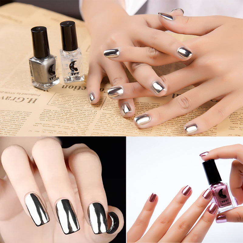 Manicured nails with reflective mirror polish, creating a striking chrome manicure