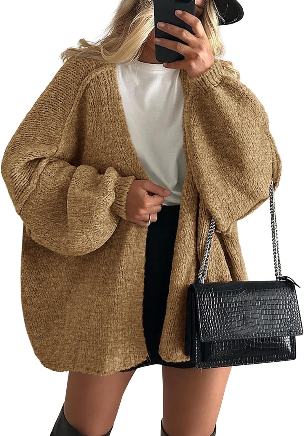 Close-up of a women's loose knit open front cardigan texture, showcasing the soft fabric.