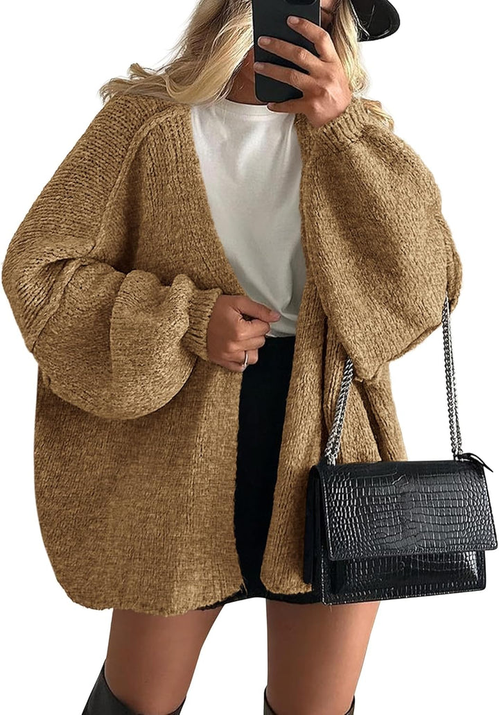 Close-up of a women's loose knit open front cardigan texture, showcasing the soft fabric.