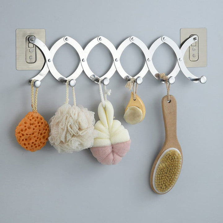 Stainless steel retractable door hanger with multiple hooks, ideal for entryway coat storage