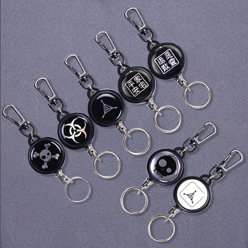 Three utility retractable key holders, featuring a sturdy wire cord and unisex design for daily convenience.