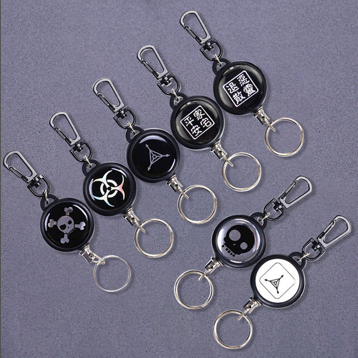 Three utility retractable key holders, featuring a sturdy wire cord and unisex design for daily convenience.