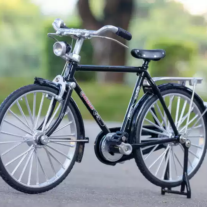 Close-up of a retro miniature bicycle model, intricate vintage decor piece