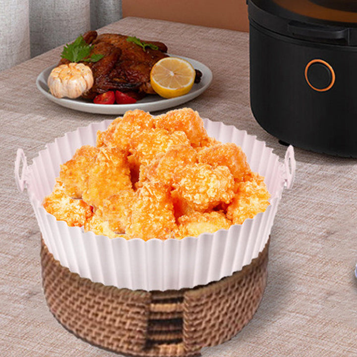 Oven-safe silicone baking mat for air fryers, a durable and reusable kitchen gadget accessory
