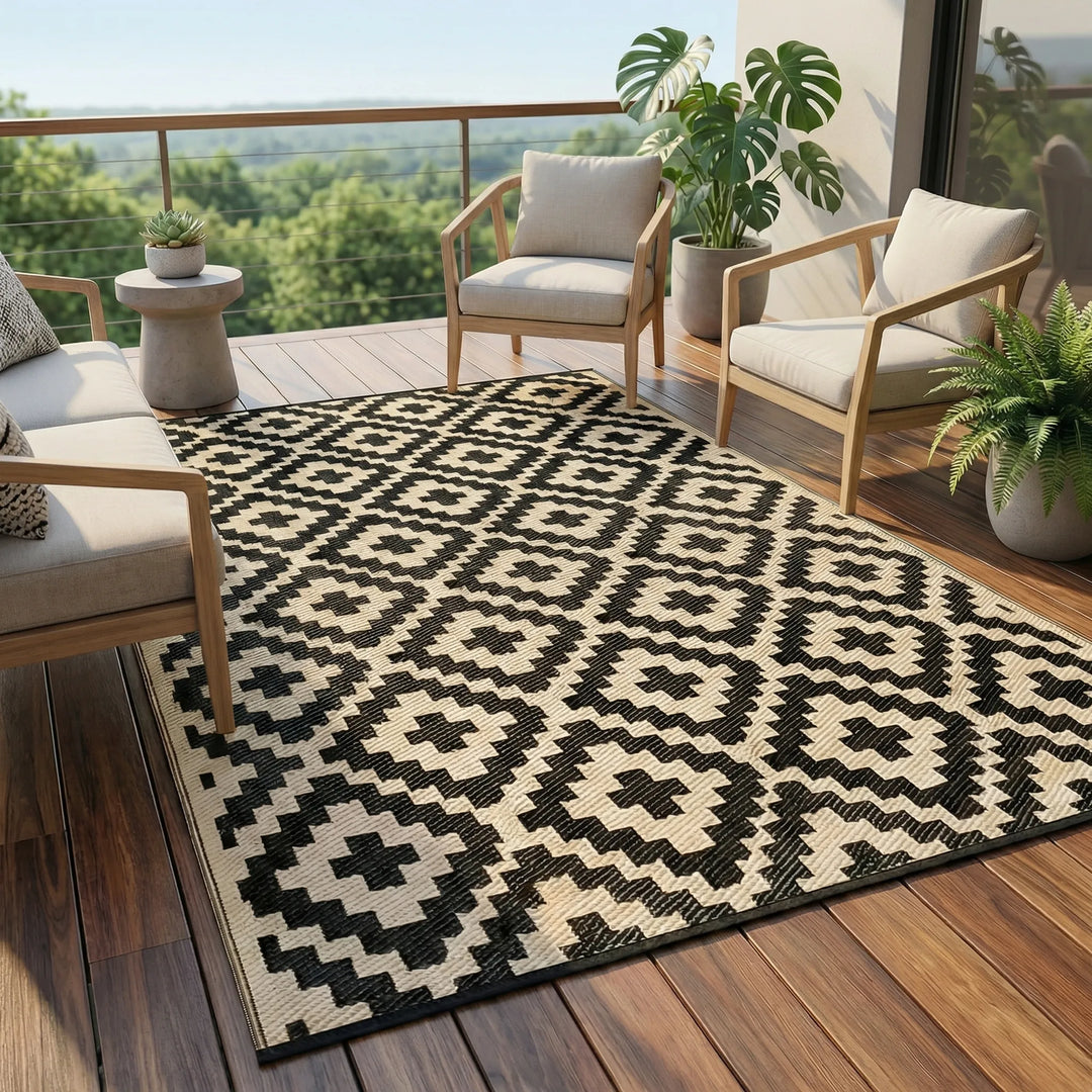 Portable outdoor geometric rug with reversible wave design. Modern, weather-resistant for patio & balcony.