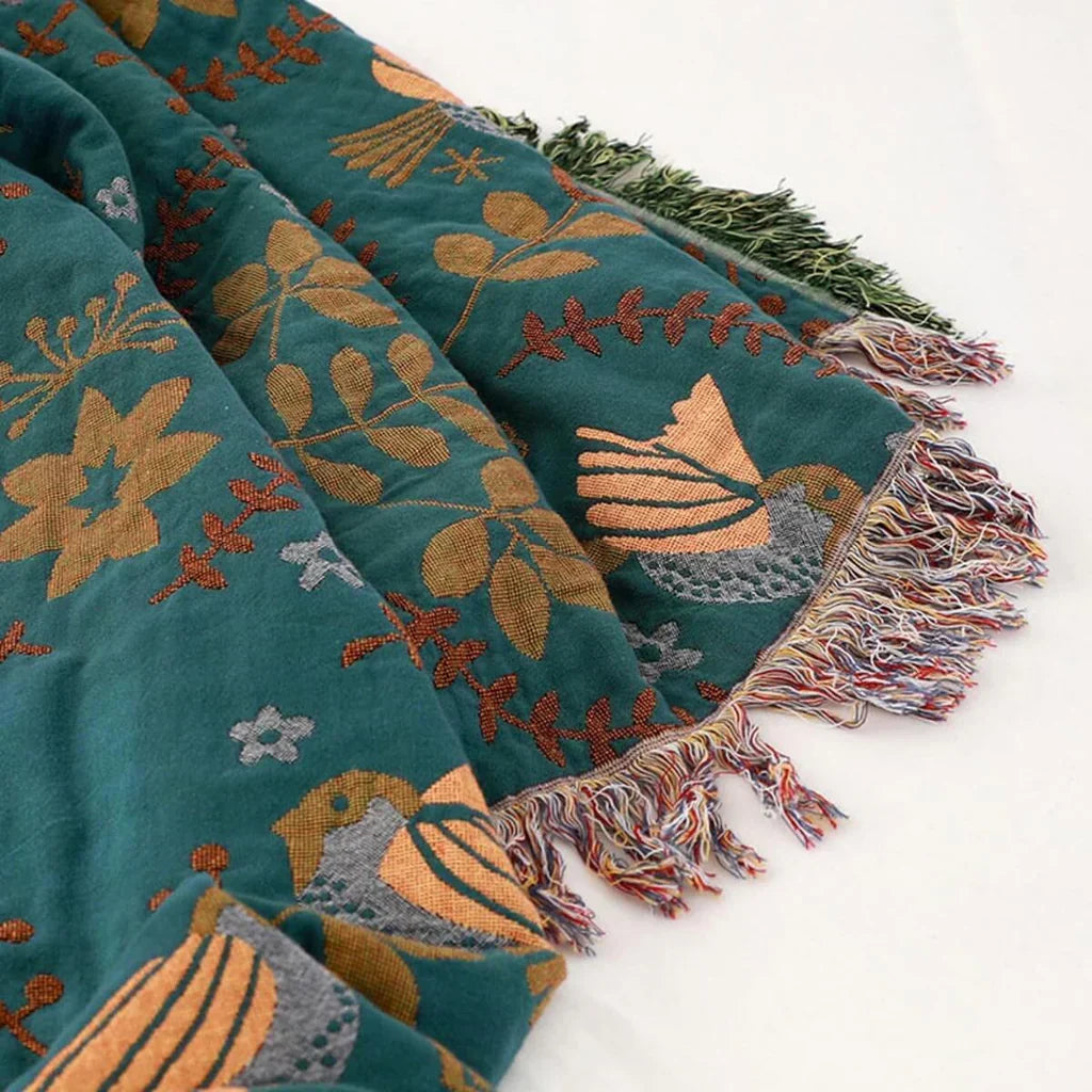 Modern reversible Scandinavian blanket with a unique bird motif, enhancing any home decor style.