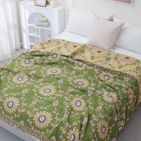 Scandinavian bird print reversible cotton blanket, perfect as a warm throw for home comfort.