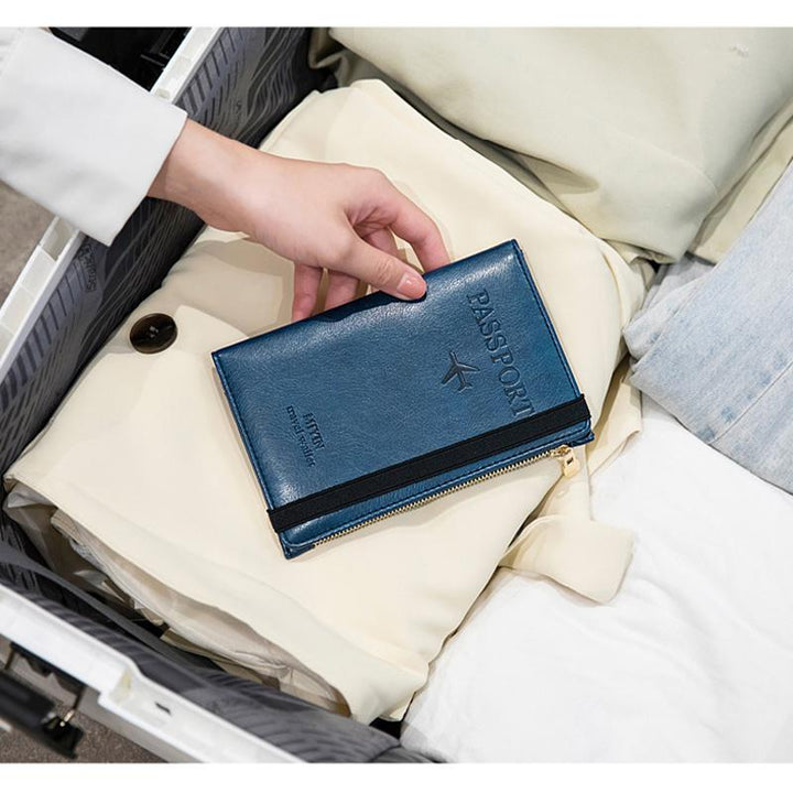 Women's RFID blocking card holder in sleek black leather, travel-friendly
