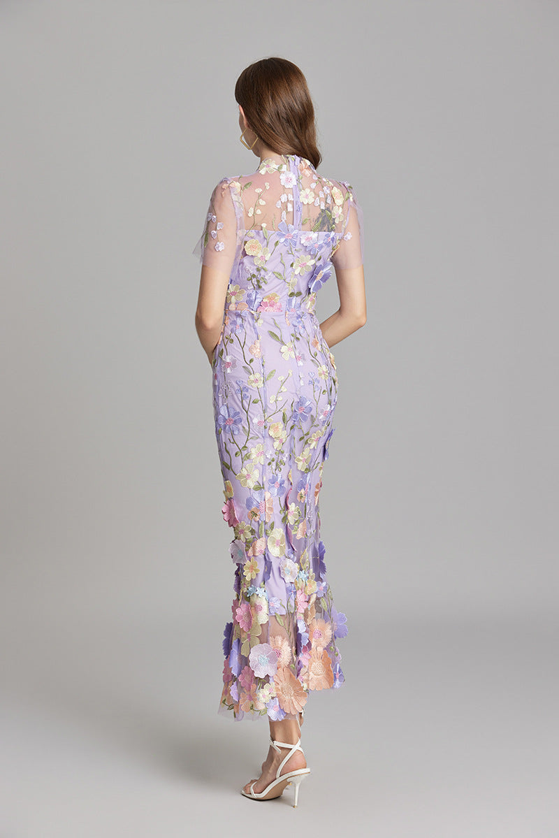 Elegant women's formal gown, mermaid silhouette, romantic floral details.