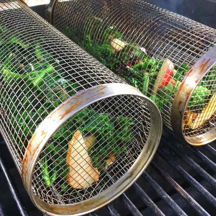 Rotating stainless steel grill basket for barbecue vegetables & meat. Essential BBQ tool.