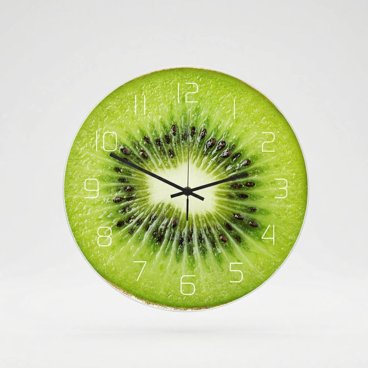 Bright round fruit print wall clock, a fun modern home accent for any room.