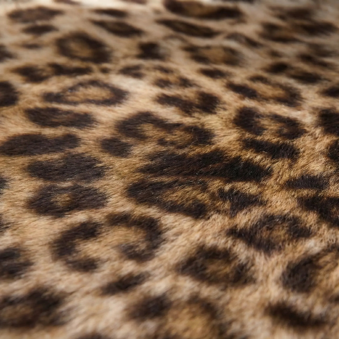 Eye-catching round animal print area rug with unique Flowique wave pattern for bold living room decor.