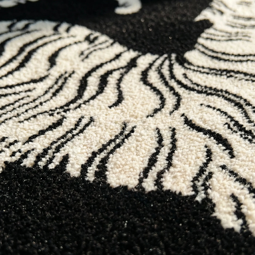 Cozy round plush tiger print bedroom area rug. Soft, stylish home decor with wavy Flowique design.