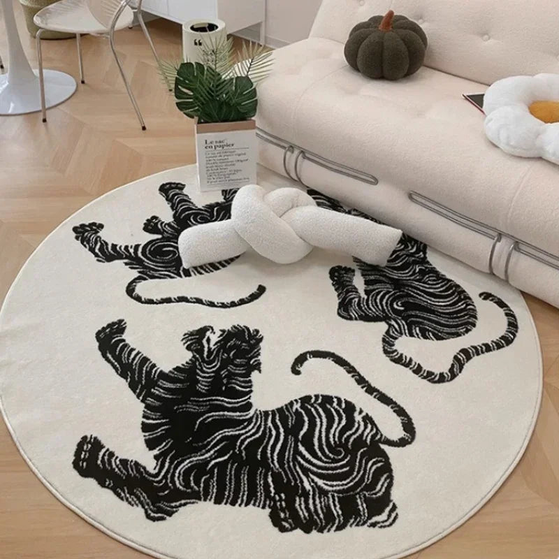 Soft plush round tiger print area rug for home decor. Distinctive wave pattern adds statement style to any room.