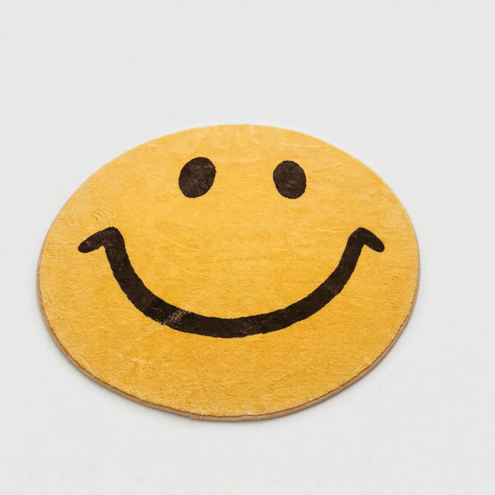 Flowique round smile face area rug with wave pattern, cheerful home decor statement piece.