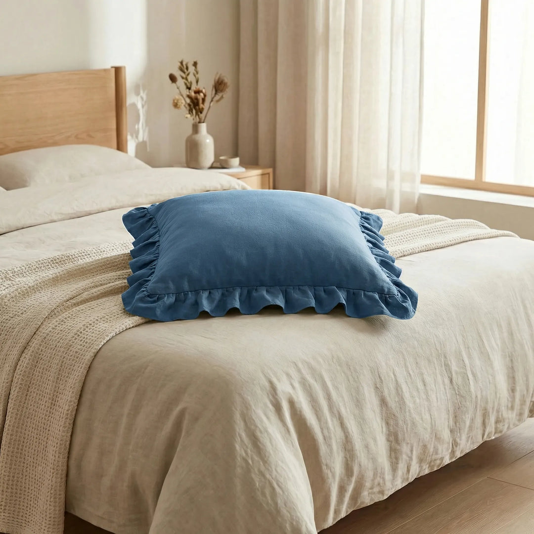 Versatile ruffled square pillow cover, ideal for enhancing living room or bedroom style.