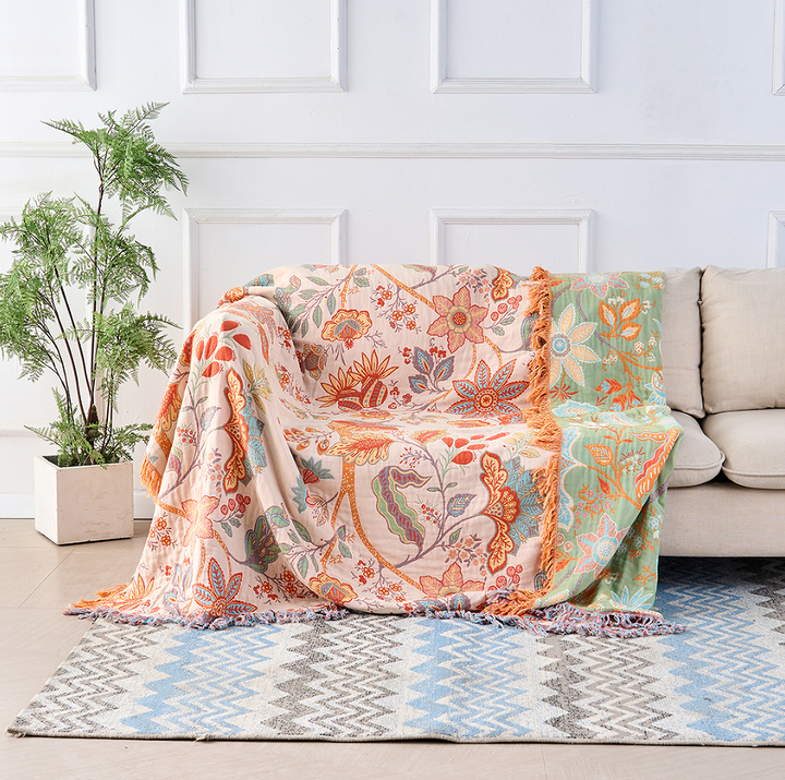 Rustic floral boho cotton blanket, soft and cozy for living room decor.