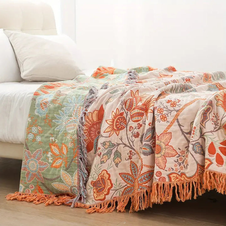 Bohemian cotton throw with a rustic floral pattern, perfect home accent.