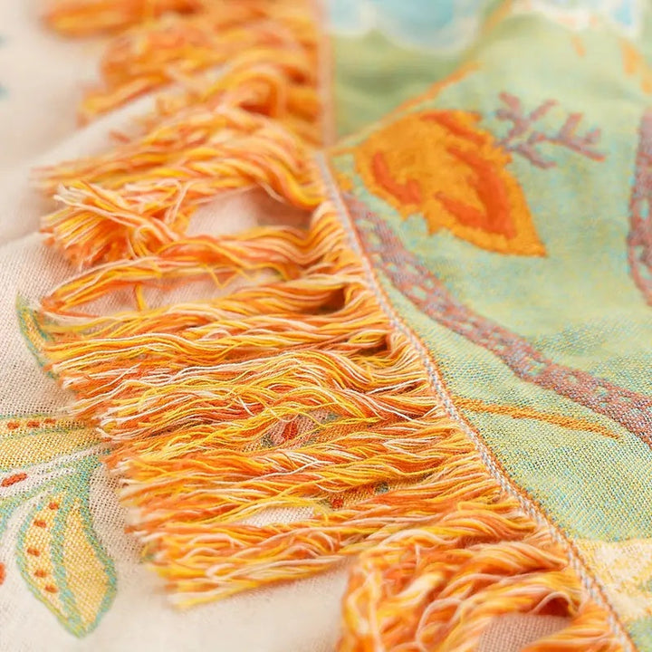 Machine washable cotton blanket featuring a beautiful rustic floral boho design.