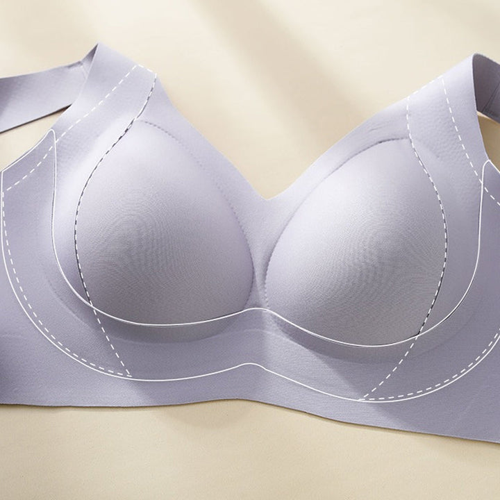 Soft seamless wire-free lifting bra for women, featuring side support panels for enhanced shape.