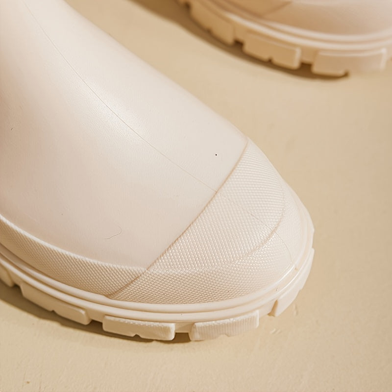Practical women's mid-height rain boots by Selora, waterproof, anti-slip, and comfortable for all-day wear.