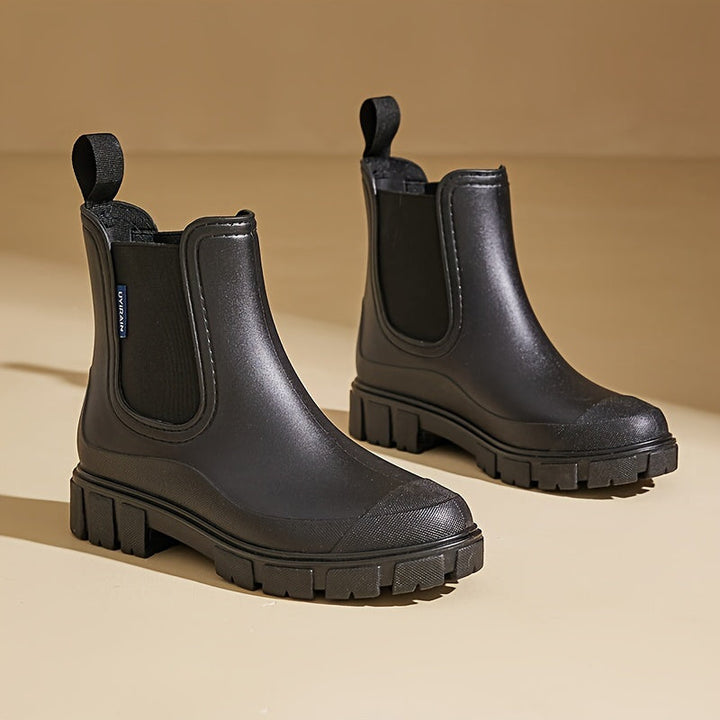 Fashionable and functional Selora mid-height rain boots for women, waterproof & anti-slip design.